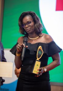 Martha Nyagaya gives her acceptance speech as Nutrition International won the Government Partnership of the Year Award.