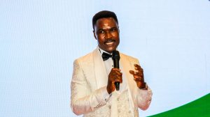 Dr. Peter Okoth Aluoch the Self Help Africa Country Director presents an acceptance speech at the NGO Awards 25.